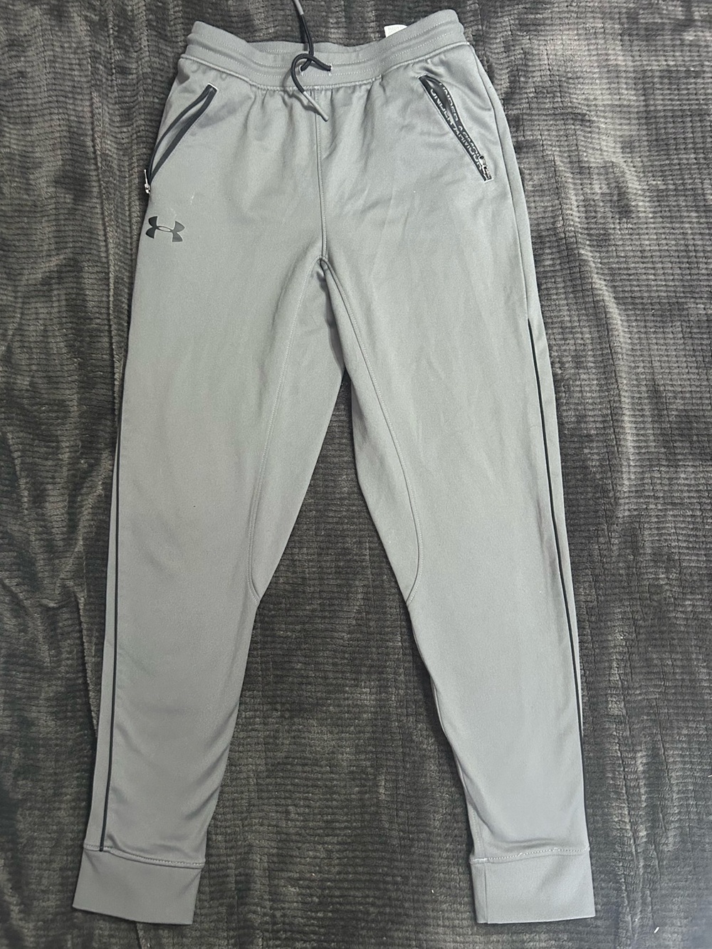 15. Under Armour Light Gray Boy’s Training Joggers